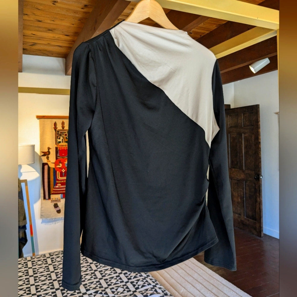 Asymmetrical neckline black and white long sleeve top